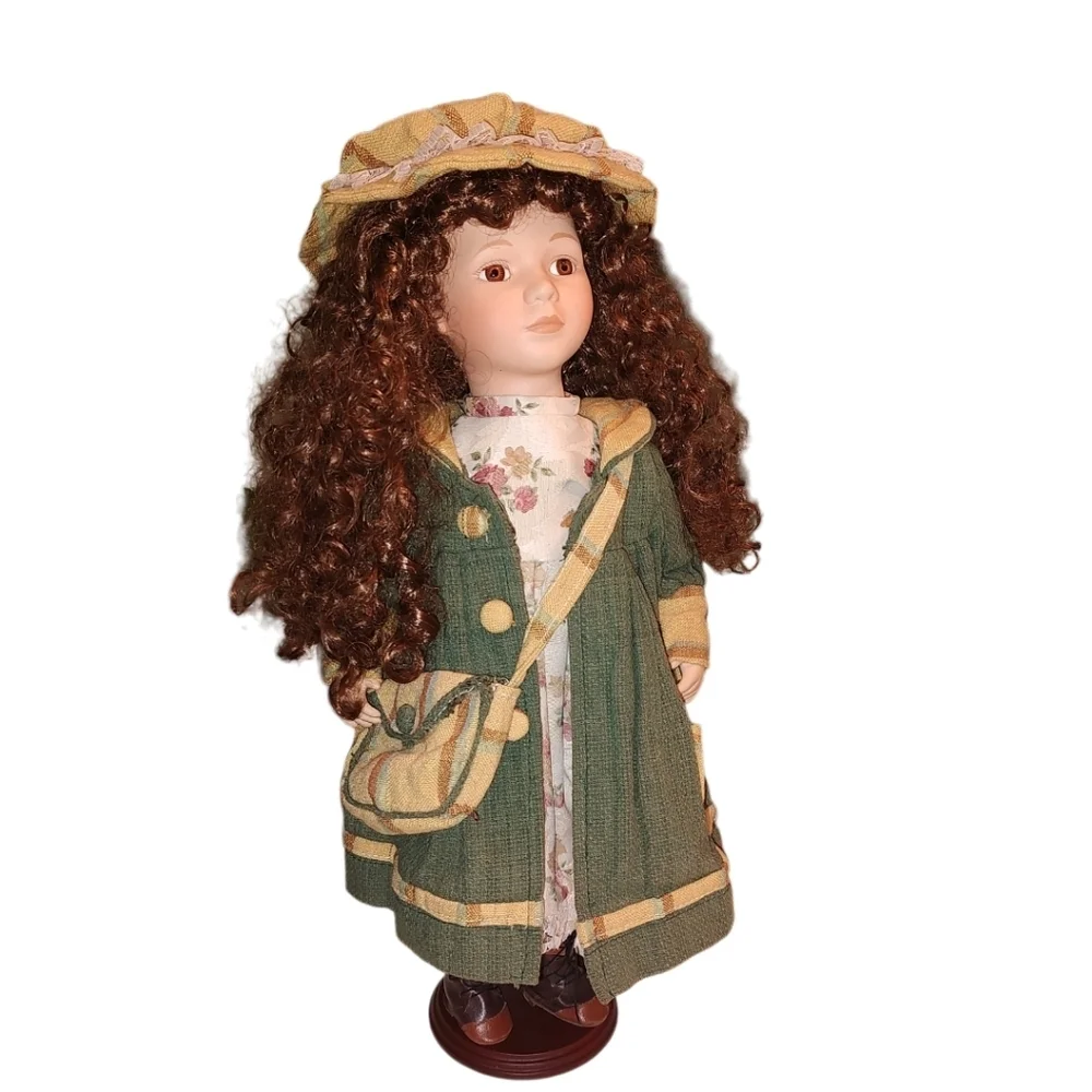 Vintage Victorian style doll With Brown Curly Hair
